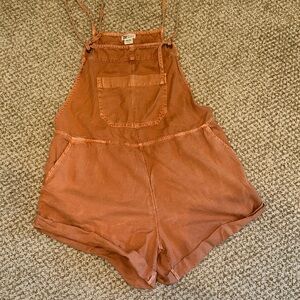 Billabong Women’s Wild Pursuit Short Overall Sz S rust (red orange tan) color